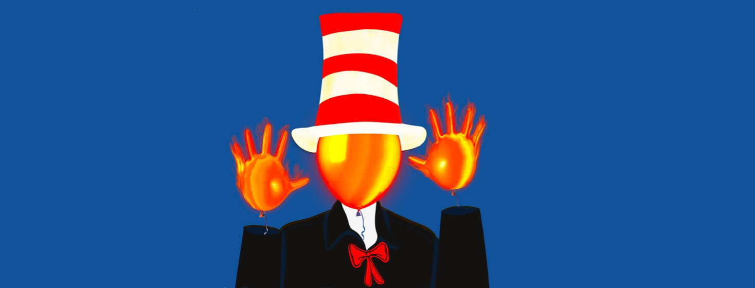 A person made of balloons on fire wearing a white and red tall hat.